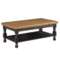 a wooden table sitting on top of a black shelf