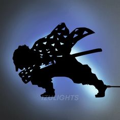 the silhouette of a man holding a baseball bat