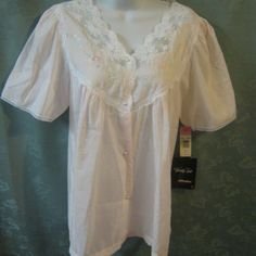 Vintage Vanity Fair Size Large Blendaire Pajama Top Nwt Pale Pink Nos Lace Trim 16 Inches From Shoulder To Shoulder 12 Inches From Shoulder To End Of Sleeve 22 Inches Across The Bust 27 Inches From Shoulder To Hem In Back White V-neck Tops For Sleepover, Fitted Spring Sleepwear For Home, Spring Pajama Party Blouse, Summer Blouse For Pajama Party, Summer Tops For Home Wear, Yellow Pajamas, Terry Cloth Robe, Yellow Two Piece, Pink Vanity