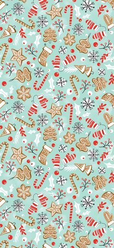 a christmas pattern with gingerbreads, candy canes and snowflakes on a blue background