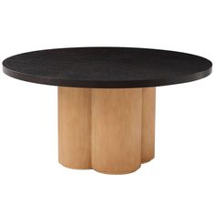 a round wooden table with black top and two wood columns in the center, against a white background