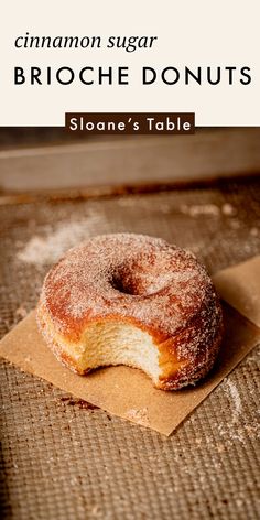 a donut sitting on top of a piece of wax paper