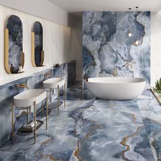 a bathroom with marble walls and flooring that looks like it has been painted blue