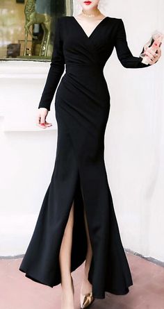 Elegant V neck Black Aesthetic Long Sleeve High Center Slit Mermaid Formal Dress. This black long dress maxi is made of a beautiful soft stretchable fabric. This black long dress maxi will make you look very elegant and feminine. The features of this long dress maxi are the following: black color, bodycon tight fitted, dress maxi (long size), with long sleeves, soft stretchable fabric, side slit, thigh split. Long Sleeve V Neck Dress Formal, Black Long Cocktail Dress, Black Winter Dress Formal, Long Tight Dresses Casual, Elegant Black Dress Classy Long, Black Elegant Dress Long, Black Formal Dress Long Classy, Elegant Goth Outfits, Black Formal Dress Long