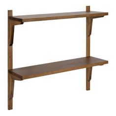 a wooden shelf sitting on top of a white wall