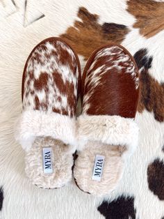 True to size fit - if you typically wear a half size, we recommend to go up to the nearest full size! **Hides will vary! Due to these shoes having genuine cowhide on them, every pair will be unique. They might be darker or lighter brown, more white or brown, etc. Cow Hide Slippers, Cowhide Shoes, Cow Hide Shoes, Watch Band Bracelet, Brown Cowhide, Under The Tree, Cow Hide, Band Bracelet, Santa Baby