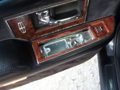 the interior of a car with an old radio