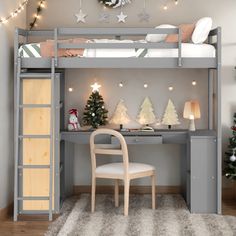 a bunk bed with a desk underneath it and christmas decorations on the wall next to it