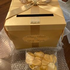 a box that has some kind of candy in it with a bow on the top