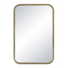 a gold framed mirror on a white background