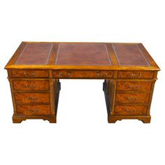 an antique desk with two drawers and one drawer on the top, is shown against a white background