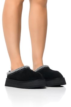 Coupon codes and promotions do not apply to this item.  Take comfort to the next level with the UGG Tazz Flat in Black! These cozy slipper-like shoes feature a smooth suede upper, upcycled wool lining, a slip-on fit, and a woven ankle band accent. Complete with contrast stitching, a pull back ankle tab, and an embossed UGG logo front detail. Complete with a textured platform sole.  Fit and details (approx. measured from a women’s size 8):  - Suede upper - Rounded toe - Platform sole - 1.5” platform sole height - Imported  Product ID: 393370 Ugg Tazz, All White Party, White Accessories, Flat Slipper, Slippers Cozy, White Party, White Outfits, Pull Tab, White Shoes