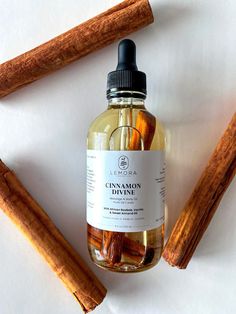 Cinnamon Divine- Massage and Body Oil Made from the solar infusion of organic Ceylon Cinnamon in Sweet Almond, African Baobab, Sunflower Seed, Jojoba, Vanilla & Ginger oils. This natural massage and body oil is earthy, spicy and sweet. Rich in antioxidants and handcrafted to help with circulation, seal hydration and lock moisture into the skin ✨ Our 100% vegan body oils are handmade in small batches to ensure high quality and freshness. Ingredients: Macadamia Seed Oil, Sunflower Seed Oil, Organic Ceylon Cinnamon, Caprylic/Capric Triglyceride, Sweet Almond Oil, Jojoba Seed Oil, Baobab Seed Oil, Vanilla Fruit Oil, Ginger Root Oil, Cinnamon Bark Oil  Made without parabens and synthetic fragrances.  How To Use: Warm a few drops of oil in your hands and massage all over body giving special care Perfumes Recommendations, Body Oil Aesthetic, Vanilla Fruit, Vegan Body, Cinnamon Oil, Ceylon Cinnamon, Ginger Oil, Beauty Oil