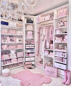 a room filled with lots of pink and white closets covered in items such as purses