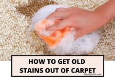 someone is cleaning the carpet with an orange sponge and rag on it, which reads how to get old stains out of carpet