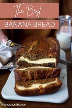 a loaf of cake sitting on top of a white cutting board next to a knife