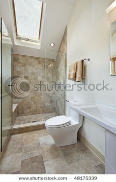 modern bathroom with skylight and tiled flooring stock photos, royalty illustrations and images