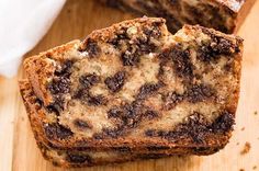 two slices of chocolate chip banana bread on a cutting board