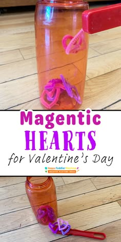 a mason jar filled with plastic hearts on top of a wooden floor next to a pair of scissors