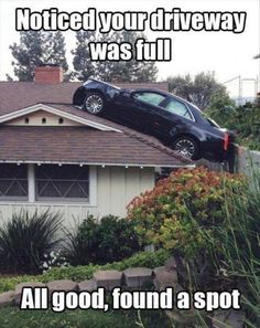 a car is upside down on the roof of a house that says, wait a second this isn't my roof