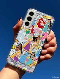 someone holding up their phone case with disney stickers on it