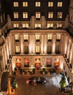 an aerial view of a large building at night