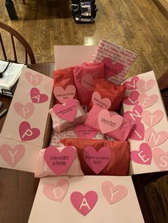 valentine's day cards in a box on the table