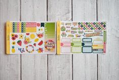 an open planner book with stickers on it