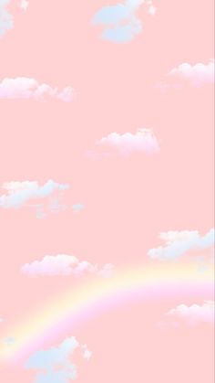 a pink sky with white clouds and a rainbow