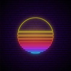 a neon circle on a brick wall with the colors of the rainbows in it