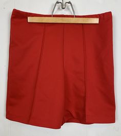 High Waisted Red Vintage 70s Shorts  Cute and comfortable primary red shorts with tuck pleat down front legs. Elastic waist with no pockets. No tag to indicate size or material. Measures MEDIUM  Polyester  Please check your measurements to ensure size accuracy. Measurements taken lying flat. Waist 15 inches with stretch to 18 inches  Hip 17 inches  Rise 12 inches Inseam 5 inches Since all sales are final, I am happy to answer any questions. Red Short Skort With Built-in Shorts, High Waist Solid Pleated Shorts, Solid High Waist Pleated Shorts, Fitted Shorts With Pleated Waist, Solid Short Pleated Bottoms, Solid Pleated Shorts, Pleated Short Shorts, Summer Pleated Solid Shorts, Red High Waist Pleated Bottoms