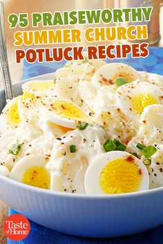 a bowl filled with potatoes and eggs on top of a blue cloth next to a fork