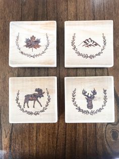 four coasters with moose designs on them