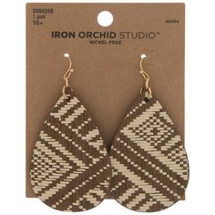 Wearing these Southwest Woven Teardrop Earrings will give you the perfect amount of rustic charm! These nickel-free teardrop shapes consist of woven beige and brown fibers. The weave forms a geometric pattern going across their surfaces that's reminiscent of southwestern tile designs. Slip their hooks on for a beautiful addition to a casual outfit! Details: 	 Length: 2 3/16" 	 Width: 1 1/2" 	 Metal Color: Gold Card contains 1 pair of earrings. Bohemian Beige Teardrop Earrings, Southwestern Tile, Paired Jewelry, Gold Card, Tile Designs, Home Supplies, Online Earrings, Beads Jewelry, Metal Color