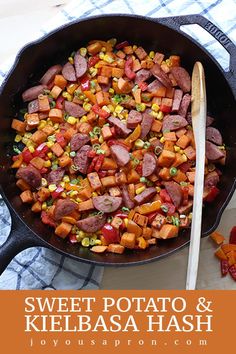 sweet potato and kielbasa hash browns in a skillet