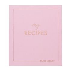 a pink recipe book with gold lettering that says may recipes on the front and side