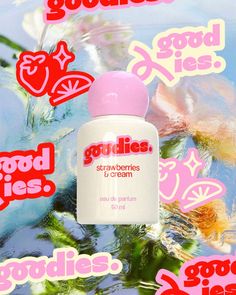 a bottle of goodies strawberryberries and cream on a colorful background with stickers