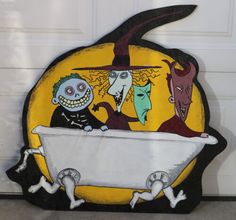 a chair that has a halloween decoration on the back of it, with an old fashioned bathtub and skeleton legs