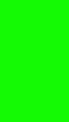 a green screen with an airplane flying in the sky on it's left side