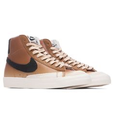 The signature Nike Blazer Mid ‘77 LX has received an all-over ‘Mushroom’ colorway which features an appealing brown tone. With a leather upper, the design features subtle Sail detailing placed at the toe, mudguard, and laces. This premium design also features black corduroy Swooshes at the exterior and at the heel tab. Signature Nike branded tongue tags make an appearance, while the white rubber outsole completes the design. DUE TO THE LIMITED NATURE OF THIS PRODUCT, ALL SALES ARE FINAL. THIS IT Nike Blazer Mid 77 Brown, Brown Nike Blazers, Nike Mid 77, Nike Blazer Mid 77 Women, Nike Blazer Mid 77, Custom Converse, Nike Blazer Mid, Nike Blazers Mid, Brown Tone