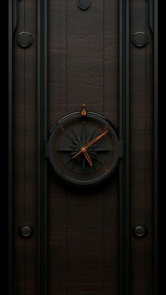 an image of a door with a compass on it