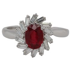 With this ring, you can be sure to grab everyone's attention. This piece is made up of a glass filled ruby stone and diamond stones in an antique style setting. The combination of these materials and the design of this ring make it stand out from the crowd and look especially beautiful on anyone's hand. This ring contains 0.44 carats total weight of diamonds, 1.21 carats total weight of ruby stones and 3.70 grams in weight. Allure Jewellery Mfg. Co., Ltd. stands out due to its quality, expertise Luxury Multi-stone Ruby Ring With Diamonds, Luxury Round Cut Multi-stone Ruby Ring, Vintage Ruby Ring With Multi-stone For Collectors, Luxury Multi-stone Ruby Ring Fine Jewelry, Luxury Vintage Multi-stone Ruby Ring, Ruby Diamond Rings, Jeweled Earrings, Things Under A Microscope, Ruby Stone