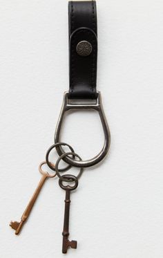 Keep your keys close with this so chic and functional keyring featured in a buttery soft leather and thin silhouette with stunning metal hardware and an oversized ring for all your essential keys. Oversized Ring, Style Gift, Sedona, Beauty Accessories, Metal Hardware, Skirt Pants, Soft Leather, Derby, Jumpsuit Dress