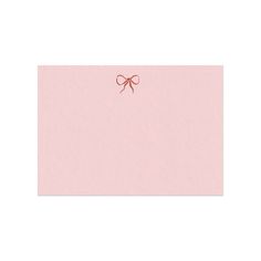 a pink card with a red bow on it