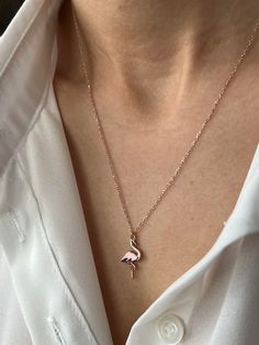 Cute pink flamingo necklace Get this beautiful minimalist jewelry made with the quality of perfect elements✨ You can choose 925K Sterling Silver with the options of Gold, Rose Gold or White Gold colors. High quality jewelry for everyone 🤍  Details * 925K Sterling Silver Option → 14K Gold, Rose Gold or White Gold plated * Chain length is approximately 18 inches (16+2 in extender) / 45 cm (40+5 cm extender) * Time is everything! You will receive your package as soon as possible 🚚  * We care about the quality of metal to make sure it will last for a long time * We use enamel technique to color the jewelry and high quality zircons only * There can be tiny differences on each item. Length difference of the chain as well as color changes and shade differences of the stones and enamel is possib Necklaces Pink, Flamingo Necklace, Cute Necklaces, Gold Colors, Pink Necklace, Gift Cute, Cute Necklace, Pink Gifts, Pink Flamingo