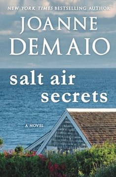 the cover of salt air secrets by joanne demaio, with an ocean in the background