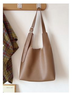 2024 new style. Simple leather tote bag. Material: High Quality PU Leather Size approximately 9.4"H x 11"W x 4.7"D Designer Style ID: 8767 Leather Tote Bag with Shoulder Strap and Inner Pouch Rectangular Large Capacity Hobo Bag For Fall, Fall Rectangular Hobo Bag With Large Capacity, Large Capacity Rectangular Hobo Bag For Fall, Fall Rectangular Large Capacity Hobo Bag, Large Capacity Satchel Baguette Bag For Fall, Fall Large Capacity Satchel Baguette Bag, Fall Hobo Bag With Large Capacity Satchel, Large Capacity Baguette Bag For Office Use In Fall, Fall Beige Soft Leather Shoulder Bag