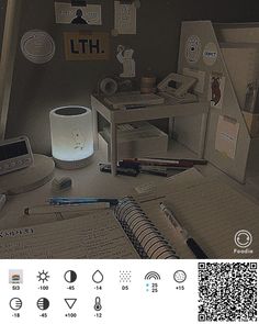 an image of a desk with various items on it and a qr code in the background