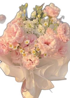 a bouquet of pink and white flowers in a vase