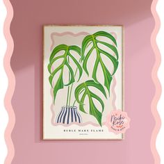 a pink wall with a green plant in a vase on the left and another painting on the right